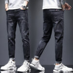 Mens Ripped Denim Jeans With Cat-Whisker Scratches - Image 2